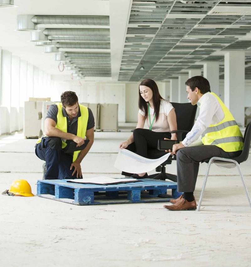 three-people-sitting-in-newly-constructed-office-s-2024-06-25-17-11-15-utc